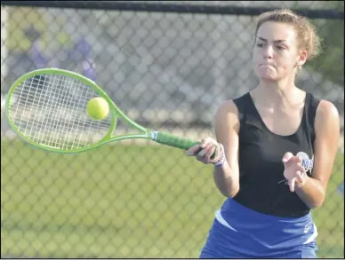  ?? Staff photo/Jake Dowling ?? St. Marys’ Brooke Fricke returns the tennis ball to her opponent during a third singles match on Thursday at the Western Buckeye League Girls Tennis Championsh­ip at Elida High School.