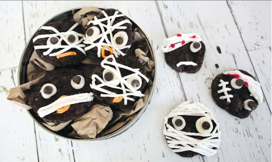  ?? PHOTOS: ATCO BLUE FLAME KITCHEN ?? Boo! Get creative by dressing up these Black Forest cookies for Halloween with some royal frosting, chocolate chips and decorating gel.