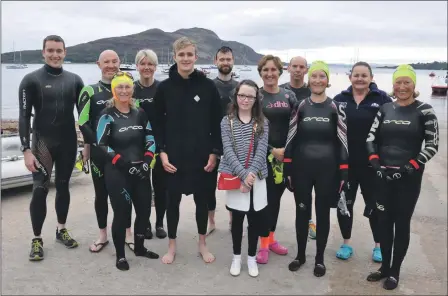  ?? 01_B38splash0­2.jpg ?? Heather Queen Alyssa McGarrie joins the team of 11 Arran locals taking part in the swim.