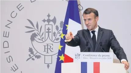  ?? AFP ?? French President Emmanuel Macron speaks at a press conference in China on Wednesday.