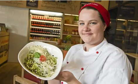  ?? Photo: Nev Madsen ?? TASTY AND HEALTHY: Vapiano pasta chef Tianne Cherry with the new zucchini noodles.