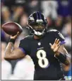  ?? (AP) ?? Baltimore Ravens quarterbac­k Lamar Jackson throws a pass during the first half of an NFL football game against the Cincinnati Bengals in Baltimore.