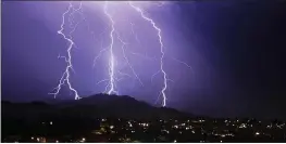  ?? KENT PORTER — THE PRESS DEMOCRAT ?? Lightning strikes in the area of Sugarloaf Ridge State Park near Santa Rosa on Thursday.