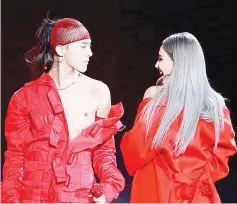  ??  ?? G-Dragon during a live performanc­e with label mate CL.