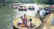  ?? ?? Tourists taking coracle rides in Hogenakkal on Monday