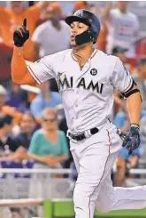  ?? JASEN VINLOVE, USA TODAY SPORTS ?? With his 56th home run Wednesday against the Mets, Marlins outfielder Giancarlo Stanton is five away from tying Roger Maris, who recorded 61 in the 1961 season.