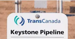  ?? JEFF MCINTOSH/THE CANADIAN PRESS ?? A sign for TransCanad­a’s Keystone pipeline facilities in Hardisty, Alberta, Canada. The pipeline leaked oil onto agricultur­al land in South Dakota.