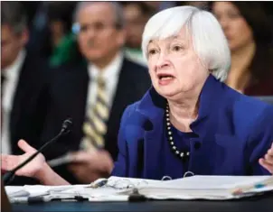  ?? BRENDAN SMIALOWSKI/AFP ?? Federal Reserve Board Chairwoman Janet Yellen. All eyes will be on the US Federal Reserve, which meets this week to decide whether to raise interest rates.