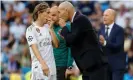  ??  ?? Zinedine Zidane talks to Luka Modric as Real Madrid desperatel­y fought back from 2-0 down against Club Brugge to force a 2-2 draw at the Bernabéu on Tuesday. Photograph: JuanJo Martin/EPA