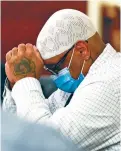  ?? MATT DAHLSEID/THE NEW MEXICAN ?? Defendant Marlon Henry bows his head Friday during closing arguments at the First Judicial District Court.