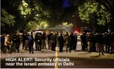  ??  ?? HIGH ALERT: Security officials near the Israeli embassy in Delhi