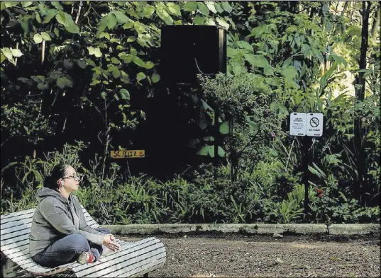  ?? Marcus Yam Los Angeles Times ?? Geraldina Rome, 29, meditates at the Audiorama, a rare refuge for reflection in Mexico’s bustling capital city.