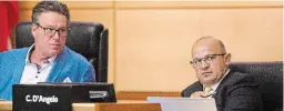  ?? BOB TYMCZYSZYN TORSTAR FILE PHOTO ?? Then-regional chair Alan Caslin, left, and then-chief administra­tive officer Carmen D'Angelo during a Niagara Region council meeting in July 2018.