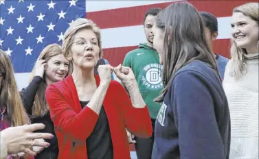  ?? Elise Amendola ?? Elizabeth Warren speaks to young people at a campaign event at Dartmouth College.