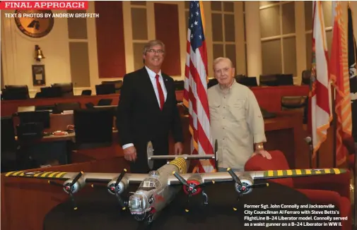  ??  ?? Former Sgt. John Connolly and Jacksonvil­le
City Councilman Al Ferraro with Steve Betts’s FlightLine B-24 Liberator model. Connolly served as a waist gunner on a B-24 Liberator in WW II.