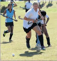  ??  ?? DETERMINED RUN: Meeca Green, of Victoria Girls High, chases possession in their U16 girls’ hockey match against Linkside