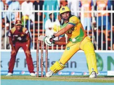  ?? Atiq Ur Rehman/Gulf News ?? Pakhtoons skipper Shahid Afridi prepares for a big one during his unbeaten half century against Northern Warriors at the Sharjah Cricket Stadium yesterday.