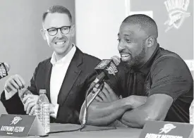  ?? [PHOTO BY JIM BECKEL, THE OKLAHOMAN] Thunder general manager Sam Presti, left, signed Raymond Felton to be Russell Westbrook’s backup. The Thunder is waiting to see if Westbrook signs a five-year contract extension this summer. ??