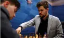  ??  ?? Magnus Carlsen makes a move against Jorden van Foreest in Wijk aan Zee. Photograph: Dean Mouhtaropo­ulos/Getty Images