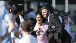  ?? MATIAS J. OCNER mocner@miamiheral­d.com ?? Inter Miami co-owner David Beckham takes a photo with fans after the conclusion of his team’s MLS soccer match against New York City FC at DRV PNK Stadium on October 30, 2021, in Fort Lauderdale.