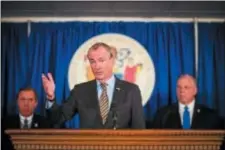  ?? SUBMITTED IMAGE ?? Phil Murphy (at podium) discusses Tuesday the measures his administra­tion will take in the wake of the deadly school shooting in Parkland, Fla.