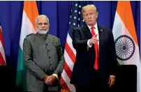  ?? Reuters ?? Narendra Modi and Donald Trump have their own initiative­s to prop up manufactur­ing and jobs in their countries. —