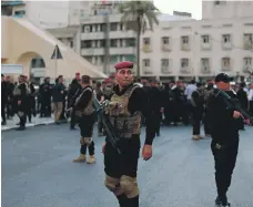  ?? AP ?? Iraqi security forces close a bridge leading to the Green Zone during protests in central Baghdad in July