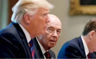  ??  ?? THE GRIFTERSRo­ss gained the president’s confidence in 1990, when he helped Trump avoid personal bankruptcy. Ross’ career as a vulture capitalist has been dogged by allegation­s of insider trading and fraud. His approach is “I’m so richI’m above the law,” says one watchdog.