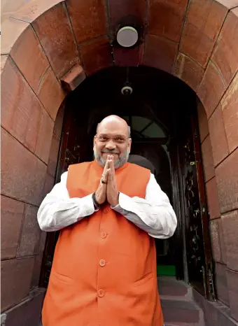  ??  ?? IN THE LEAD Union home minister Amit Shah arrives in Parliament for the CAB debate, Dec. 9