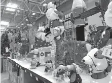  ??  ?? Christmas decoration­s are displayed Friday at a Lowe's store in Northglenn, Colo. [DAVID ZALUBOWSKI/ THE ASSOCIATED PRESS]