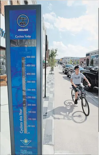  ?? PETER LEE WATERLOO REGION RECORD ?? The bicycle counter on King Street South and Erb Street East in uptown Waterloo has a daily average of 165 people bicycling by the counter per day.