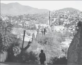  ?? Don Bartletti
Los Angeles Times ?? THIS BORDER TOWN, left, once attracted shoppers. Now warehouses bring in money, but they aren’t exactly tourist attraction­s, so the city seeks a new purpose.