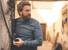  ?? HOPPER STONE, SMPSP/OPEN ROAD FILMS/BRIARCLIFF Entertainm­ent ?? Gerard Butler stars in “Kandahar” as an undercover agent who races to get out of Afghanista­n along with his interprete­r.