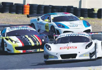  ?? Picture: Dave Ledbitter ?? FAST STUFF. Dawie Joubert (Motul Lotus Exige Honda) leads Marcel Angel (Autohaus Angel Ferrari 458 GT3) in Saturday’s opening G&H Transport Extreme Supercar race.