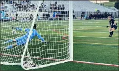  ?? Keith Barnes/Tri-State Sports & News Service ?? Quaker Valley sophomore defender Nick Allan fires a penalty kick past Lewisburg goalkeeper Tony Burns.