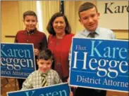  ?? PAUL POST — PPOST@DIGITALFIR­STMEDIA.COM ?? Saratoga County District Attorney Karen Heggen’s nephews show their support during a campaign kickoff Thursday. They are, from left, Matt, Dan and Andy Heggen.