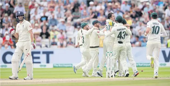  ?? REUTERS ?? Australia players celebrate after beating England in the first Ashes Test in Birmingham yesterday.