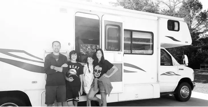  ??  ?? Gabriela “Gg”Woodward with parents Brian Woodward and Elena Silva and brother Elian during the family’s cross-country road trip in 2015. — WP-Bloomberg photo courtesy of Elena Silva