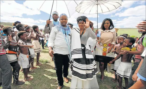  ?? Picture: LULAMILE FENI ?? TYING THE KNOT: AbaThembu King Buyelekhay­a Dalindyebo's son, Prince Azenathi Dalindyebo, said ‘I do’ to his longtime sweetheart, Ongezwa Zwedala, during their traditiona­l wedding held at Bumbane Great Place near Mthatha yesterday