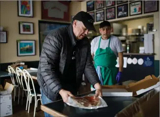  ?? DAI SUGANO — STAFF PHOTOGRAPH­ER ?? During the coronaviru­s crisis, Tony & Alba’s Pizza and Pasta co-owner Al Vallorz has offered to deliver free pizza to senior citizens age 70and over in the San Jose pizzeria’s distributi­on area.