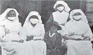  ?? NEIL MACBETH ?? Nurses at Temuka’s Ma¯ori Hospital, in South Canterbury, during the 1918 influenza pandemic.