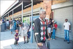  ??  ?? Breadwinne­r: Sipho Nkosi, who is disabled, lives in a shack and sends two-thirds of his grant to relatives, keeping just R500 for himself