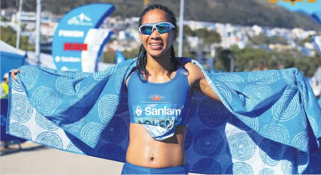  ?? Pictures: Gallo Images ?? BEATING ADVERSITY. Nolene Conrad surprised herself by clocking a new personal best at the Cape Town Marathon last Sunday.