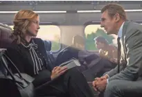  ?? JAY MAIDMENT ?? Vera Farmiga (left) has a mission, and a warning, for Liam Neeson in “The Commuter.”