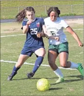  ?? ♦ Scott Herpst ?? Heritage’s Carol Anne Giannamore jockeys for position during last week’s first-round playoff win over Arabia Mountain. The Lady Generals will host Madison County at 5:30 p.m. this Wednesday in round two.