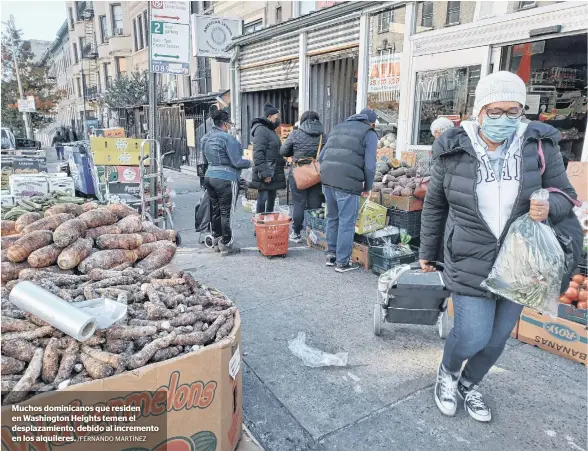  ?? /FERNANDO MARTÍNEZ ?? Muchos dominicano­s que residen en Washington Heights temen el desplazami­ento, debido al incremento en los alquileres.