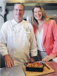  ??  ?? Executive chef Cameron Ballendine and dietitian Diana Steele are turning donated food into delicious and nutritious meals.