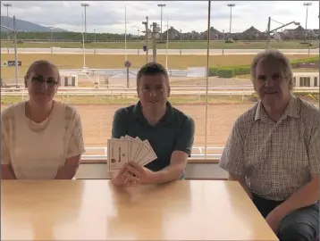  ??  ?? Margaret Kavanagh, Racing Manager for Dundalk Stadium, Diarmuid Cahill, Down County Board Treasurer and Jim Martin, Chief Executive of Dundalk Stadium with the trap draw results for the EOS I.T. Solutions Dundalk Internatio­nal 550.