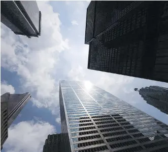  ?? ADRIEN VECZAN/THE CANADIAN PRESS FILES ?? RBC, CIBC and TD posted solid numbers for the quarter. They also expect the momentum to continue despite underwriti­ng changes that kicked in at the start of the year, including a new stress test for uninsured mortgages that banks anticipate will slow...