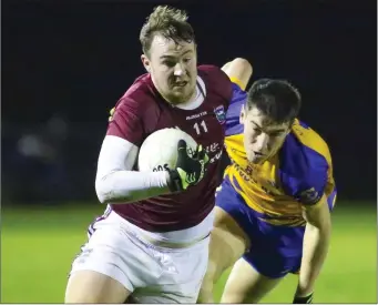  ??  ?? Joe Coleman of St. Martin’s bursts forward against Gusserane. The Premier final is on Friday at 8pm.